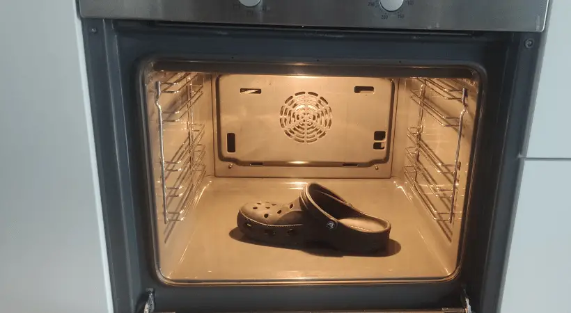 A crocs clog in an oven