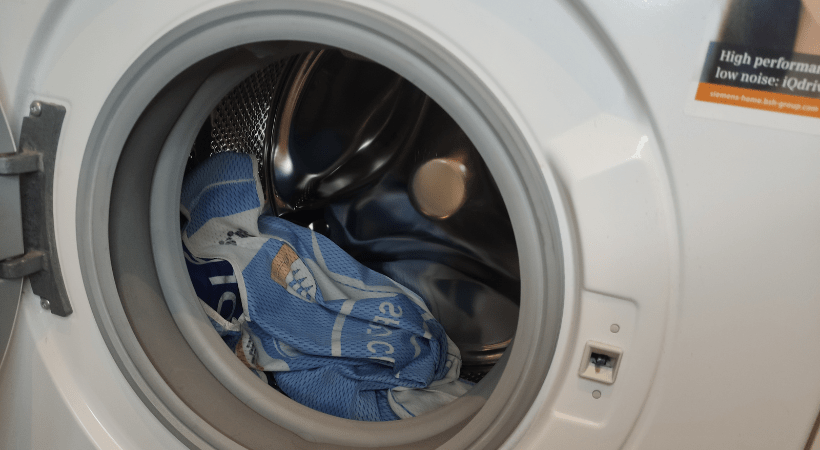 a basketball jersey in a washing machine