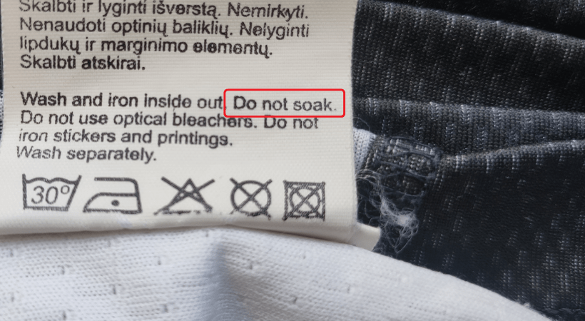 Instructions stating "do not soak" on a manufacturer's tag of a basketball jersey