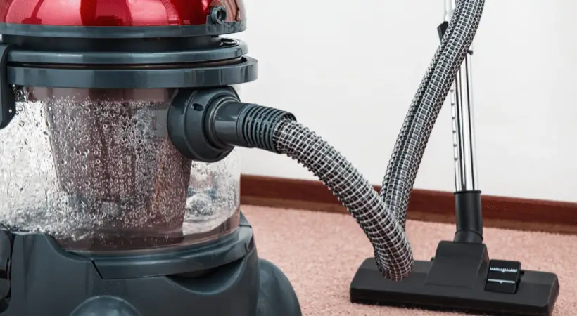 Vacuum cleaner on the carpet