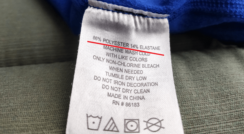 Manufacturer's tag on sports jersey that informs about the material jersey is made of.