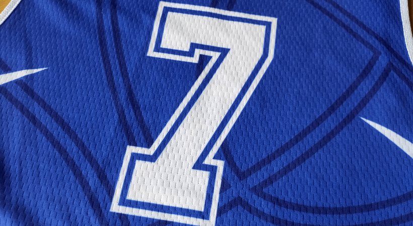 Basketball jersey with the number that's part of the fabric.