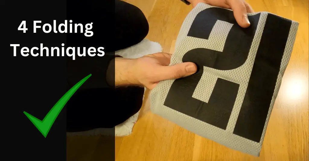 correctly folded basketball jersey with a green tick mark next to it.